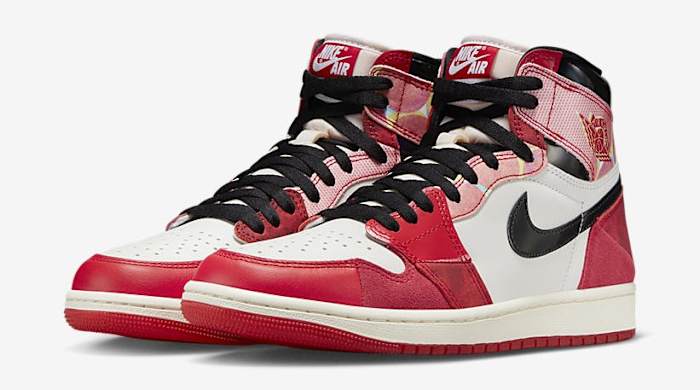 Side view of red, white, and black Air Jordan sneakers.